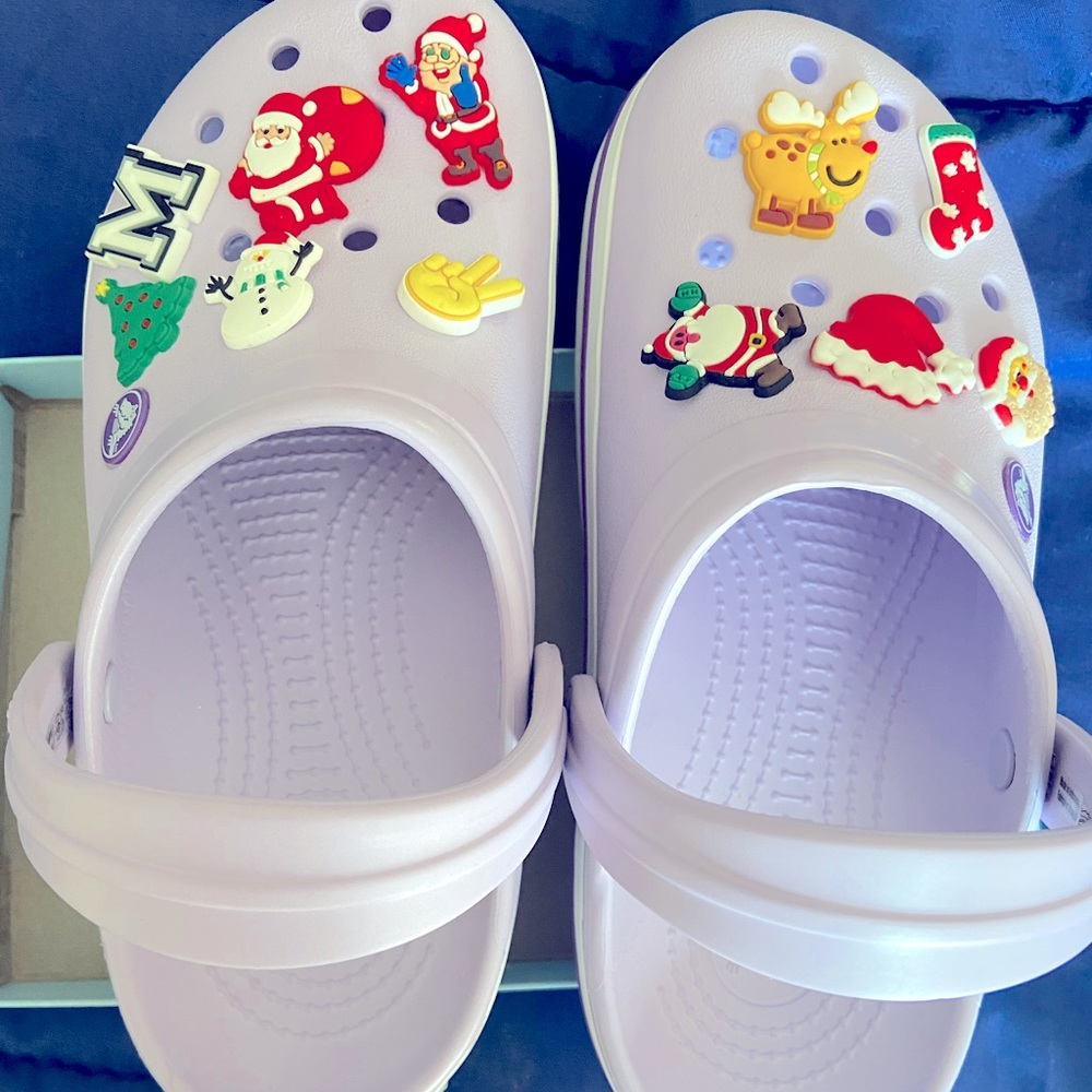 Brand new never worn Lavender CROCS with Christmas pop ones included.